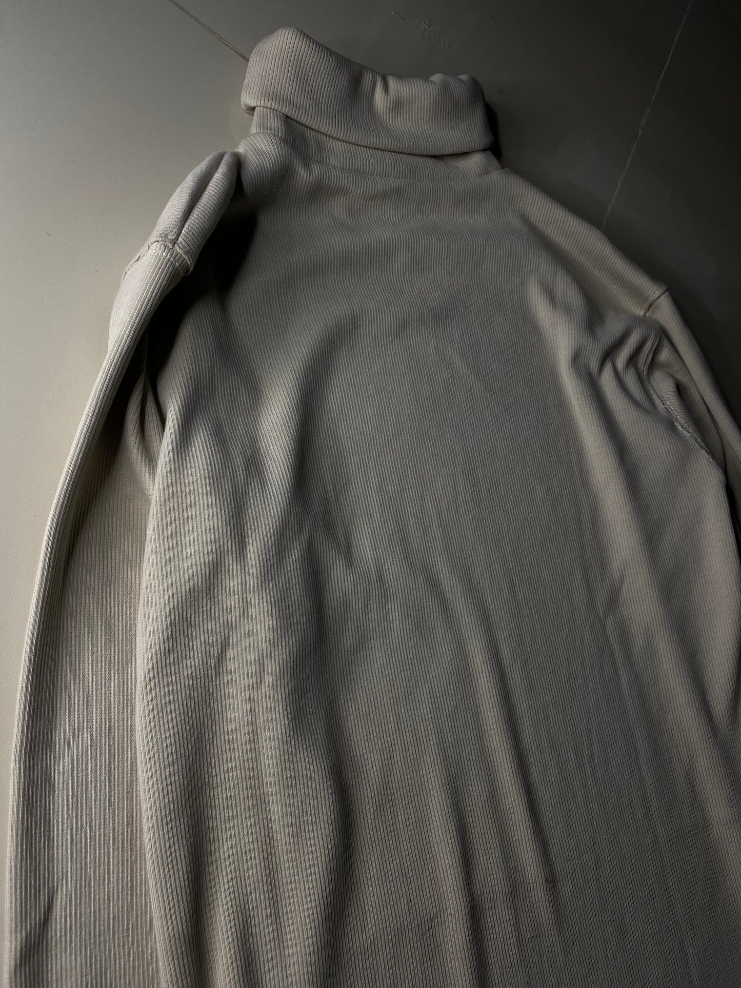 Creme white turtle neck.