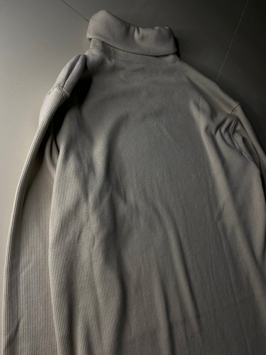 Creme white turtle neck.