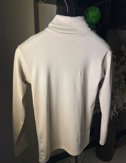 Creme white turtle neck.