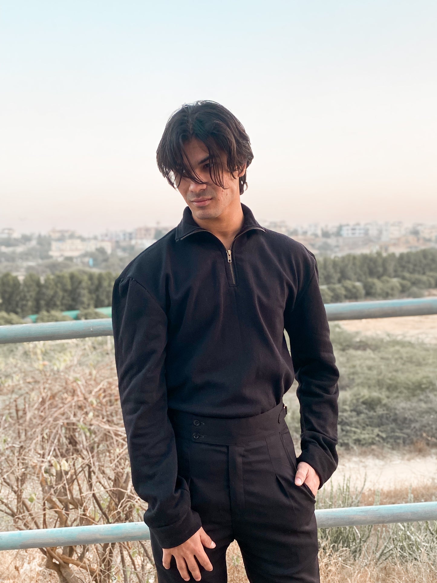 Black quarter zipper sweater